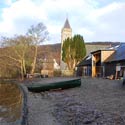 view of the half&ndash;finished extension from the lake 